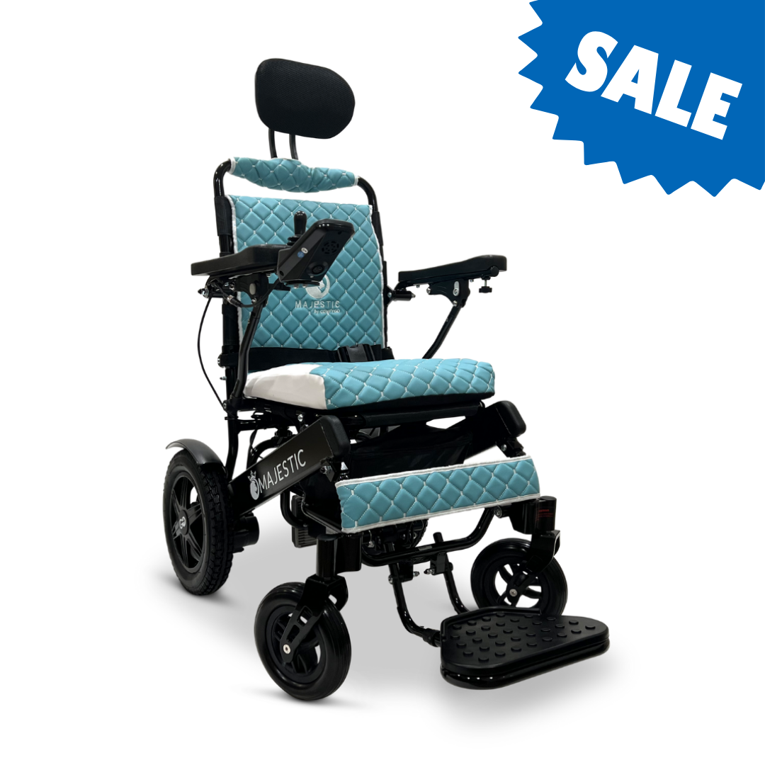 The ComfyGo MAJESTIC IQ-9000 Auto Recline Remote Controlled Electric Wheelchair in teal features quilted cushions and an adjustable headrest, shown on a white background with a blue SALE banner in the top right corner.